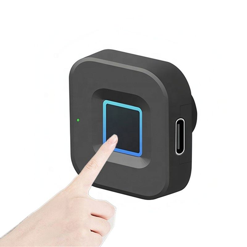 Finger touching fingerprint sensor on cabinet lock module